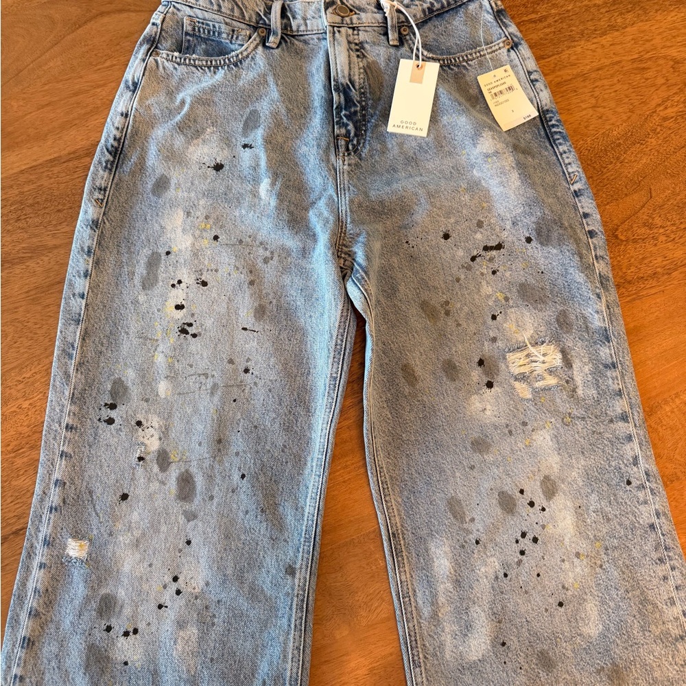 Good American Light Blue Jeans with paint splatter